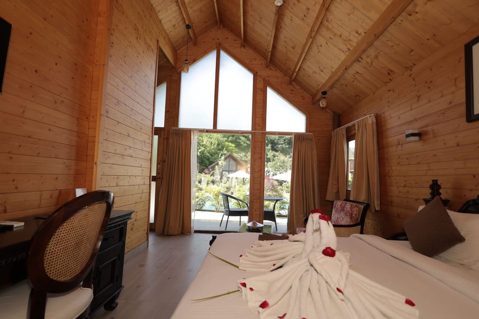 Junior Cottage, Pool View | Desk, iron/ironing board (on request), WiFi (free)