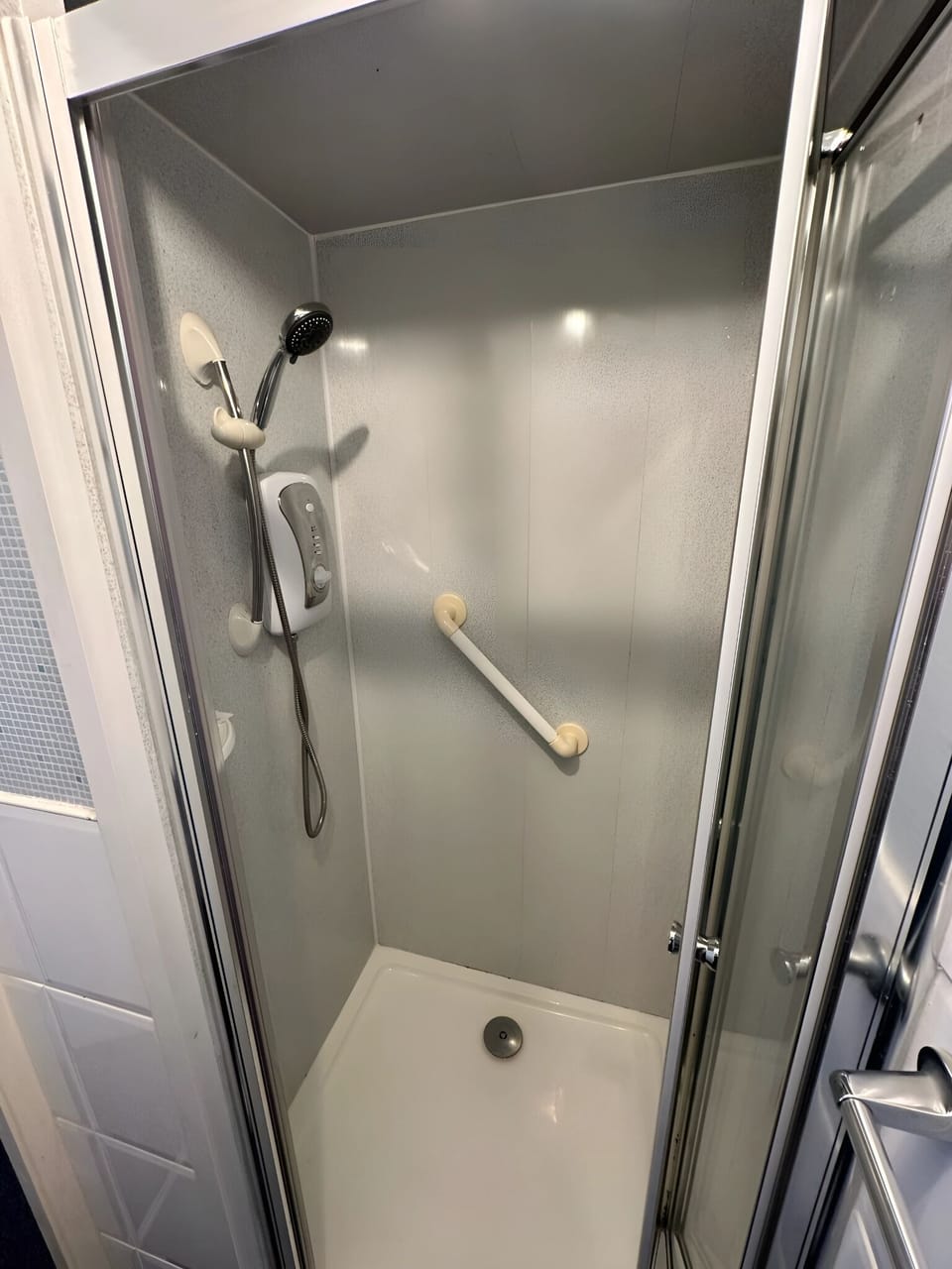 Shower, towels, soap, shampoo