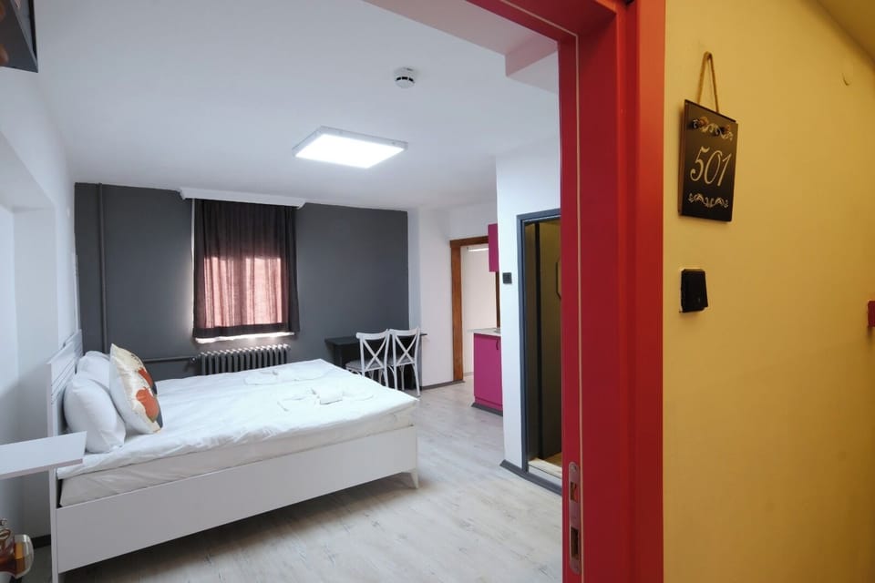 Standard Quadruple Room, City View | Desk, free WiFi