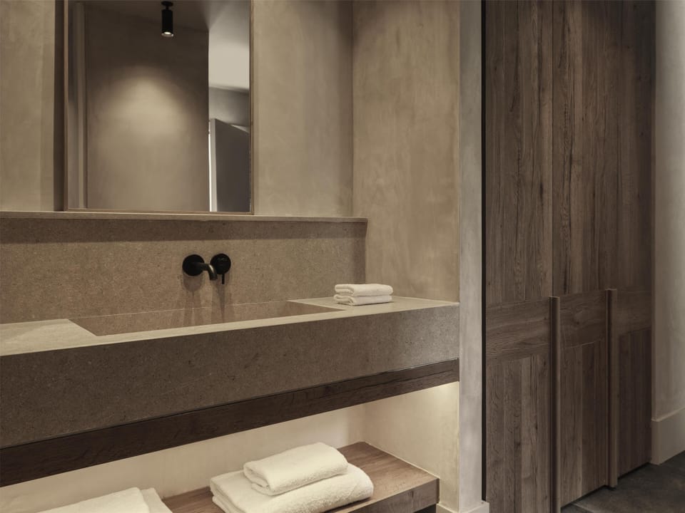 Designer toiletries, hair dryer, bathrobes, slippers