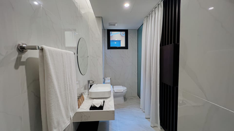 Standard Townhome, Balcony, City View | Bathroom | Shower, hair dryer, towels, soap
