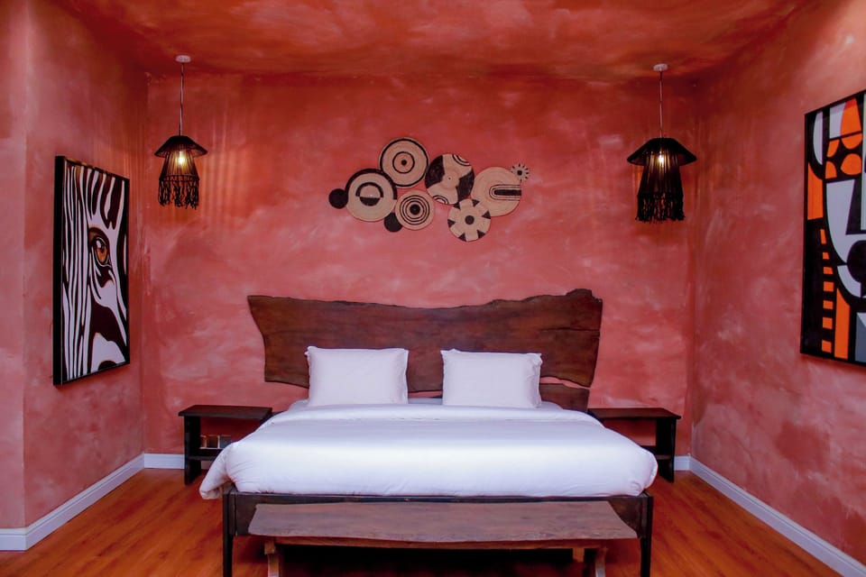Luxury Suite, Balcony, Pool View | Desk, laptop workspace, soundproofing, free WiFi