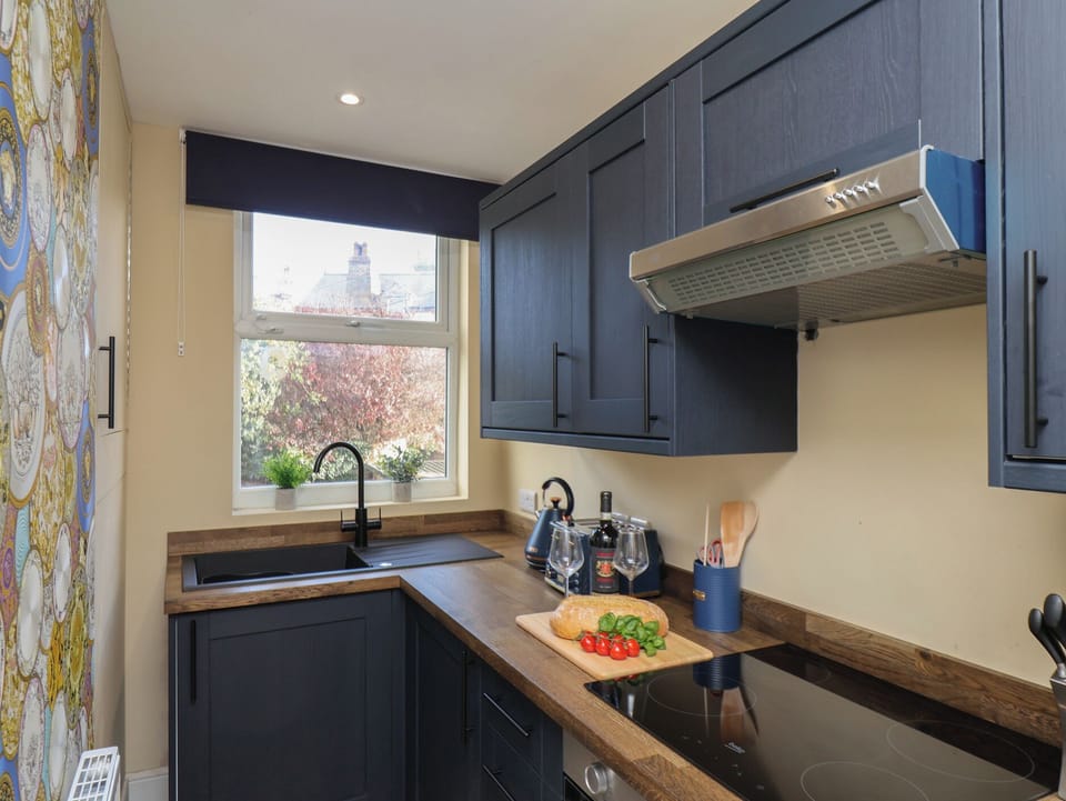 Fridge, microwave, toaster, cookware/dishes/utensils