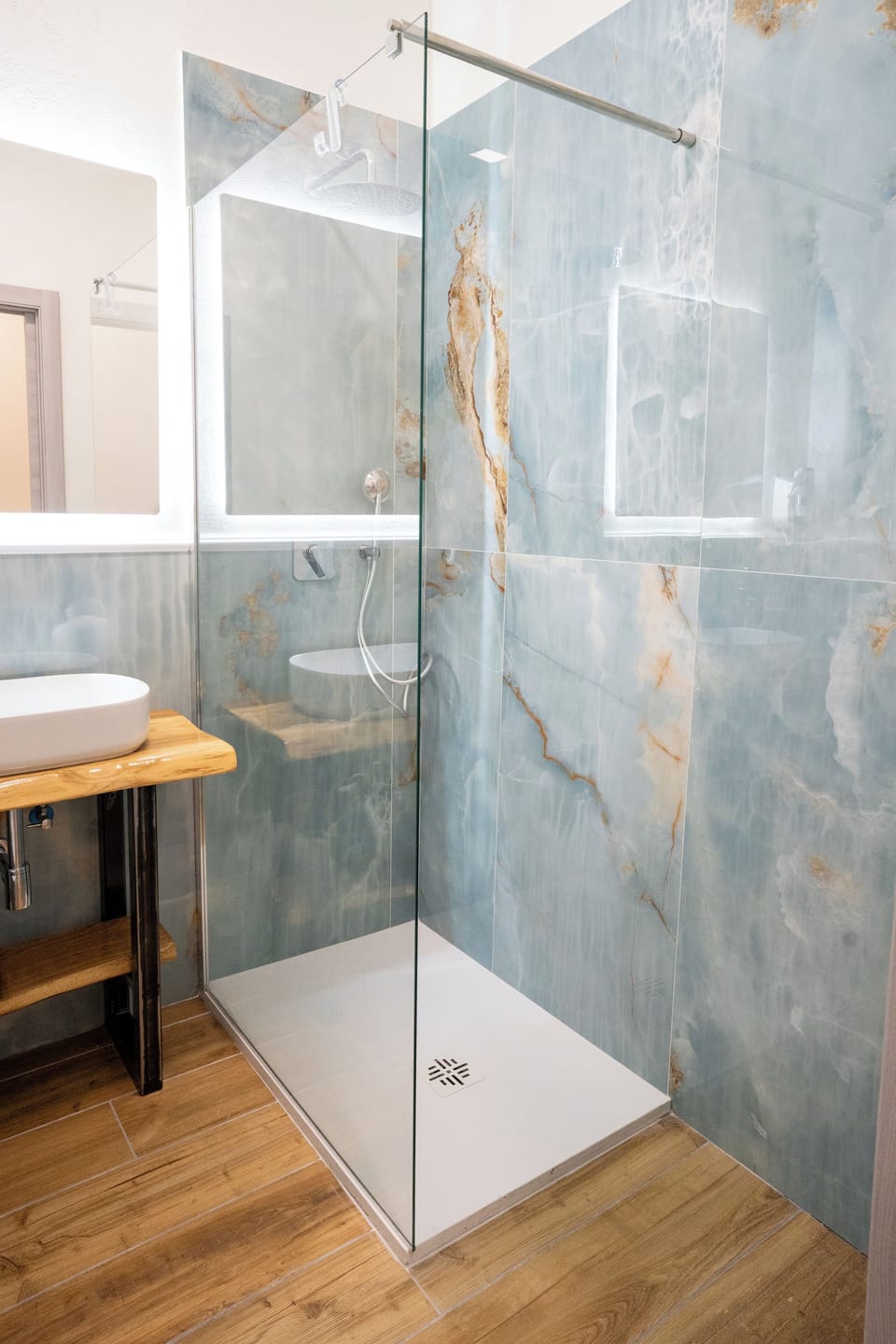 Deluxe Double Room, City View | Bathroom | Shower, hair dryer, slippers, towels