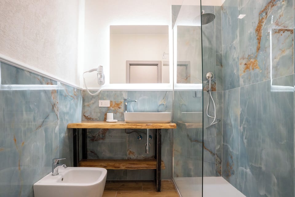 Classic Room, Hill View | Bathroom | Shower, hair dryer, slippers, towels