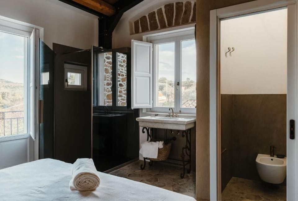 Shower, bathrobes, slippers, bidet