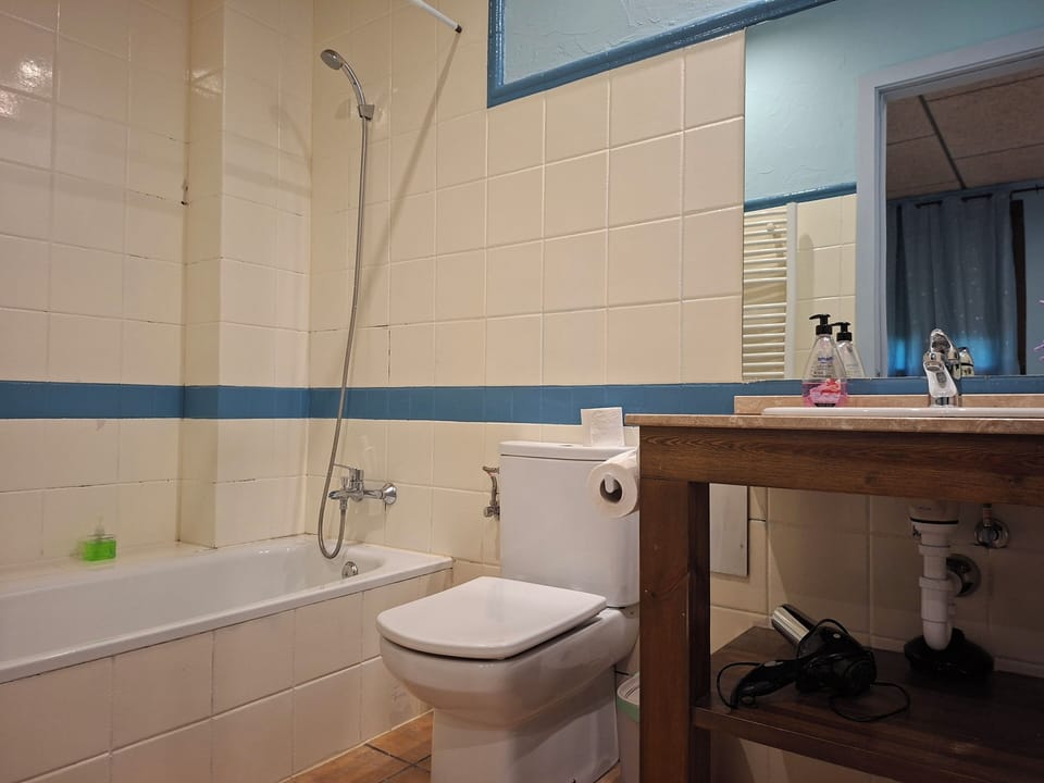 Quadruple Room | Bathroom | Hair dryer, towels, toilet paper
