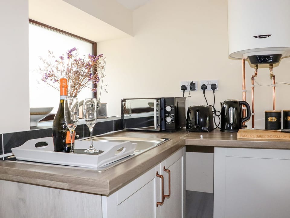 Fridge, toaster, cookware/dishes/utensils