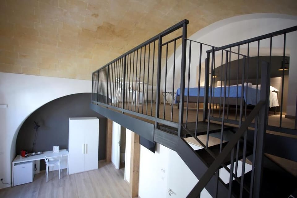 Deluxe Quadruple Room, City View | Blackout drapes, free WiFi