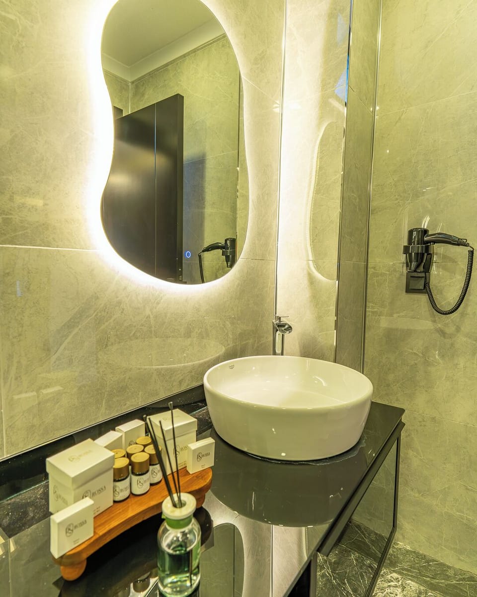 Shower, towels, soap, shampoo