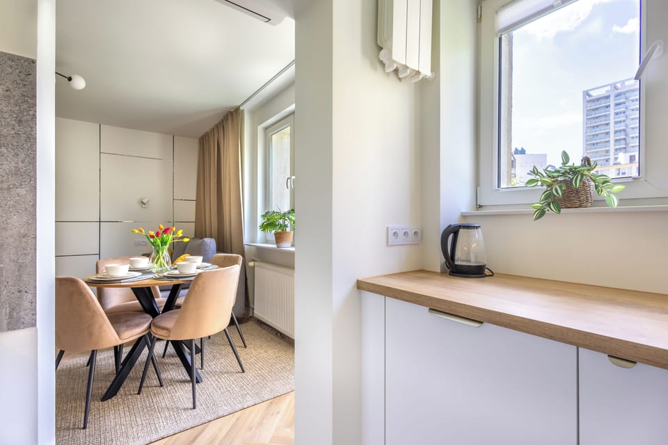 Apartment, City View | Living area | 55-inch Smart TV with cable channels