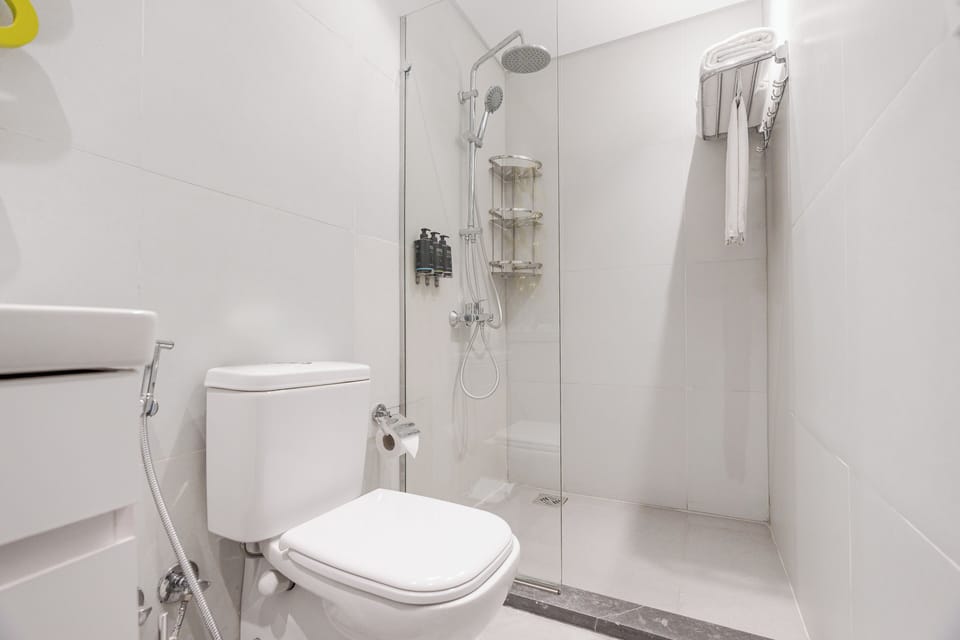 Shower, free toiletries, hair dryer, slippers