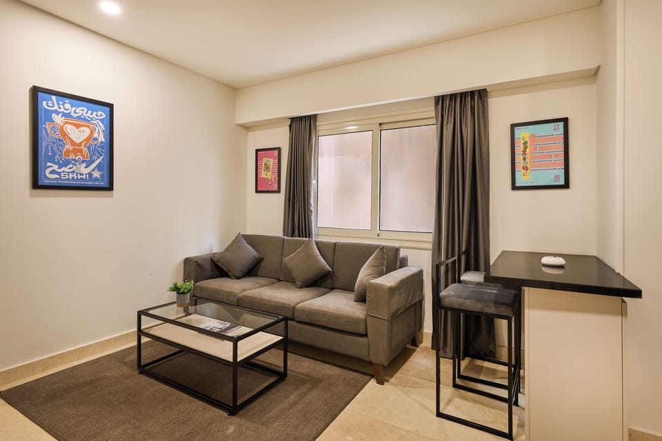 Apartment, 1 Bedroom, Courtyard View | Living area | 55-inch Smart TV with digital channels, Netflix, streaming services