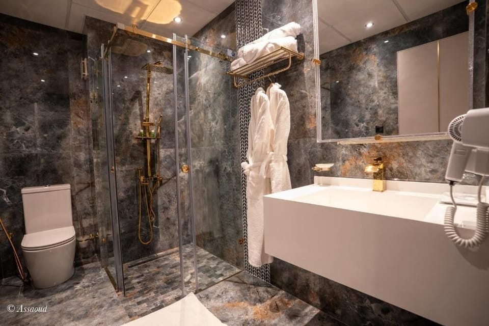 Shower, bathrobes, slippers