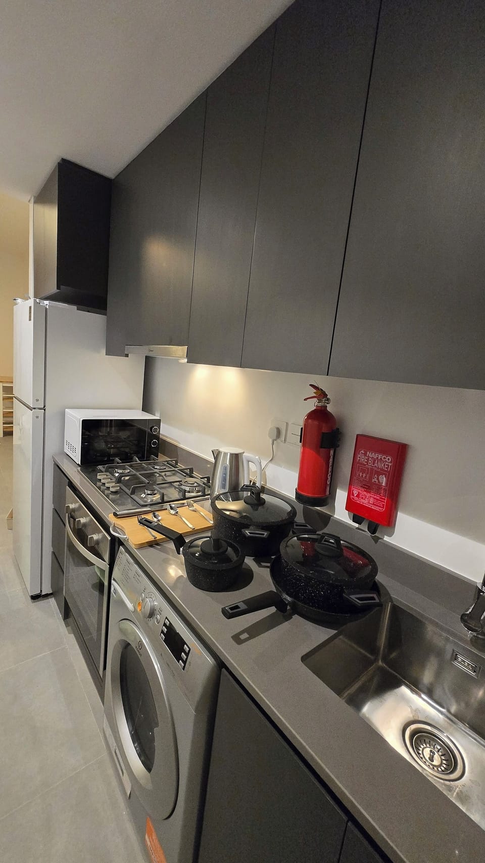 Luxury Studio, Courtyard View | Private kitchen | Full-size fridge, microwave, oven, stovetop