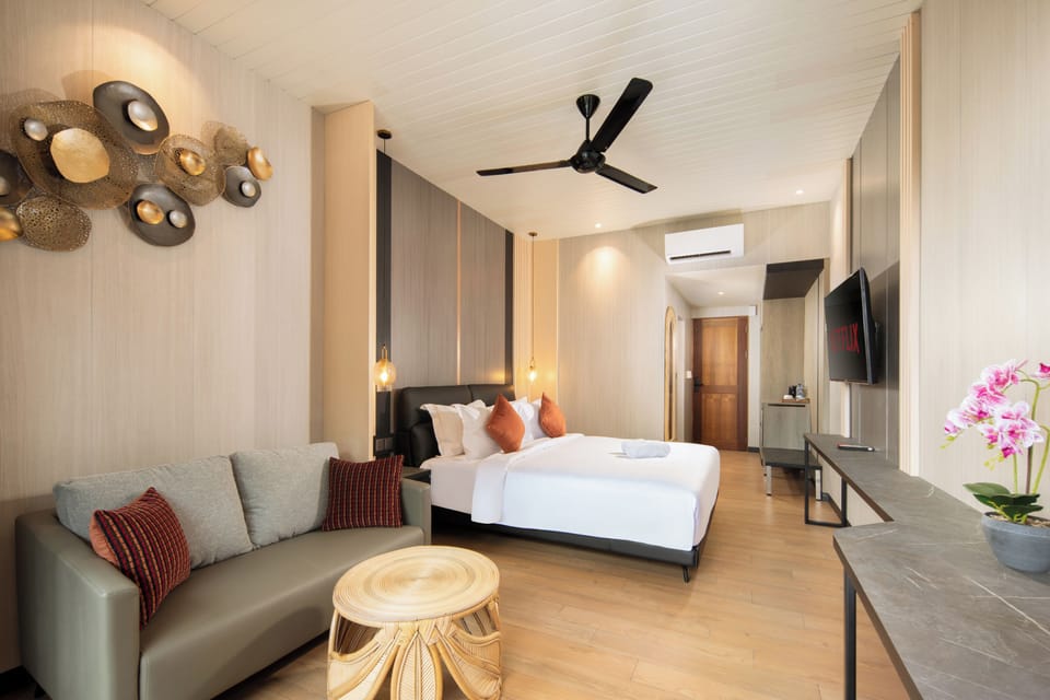 Deluxe Suite, Balcony, Garden View | Premium bedding, pillowtop beds, minibar, in-room safe