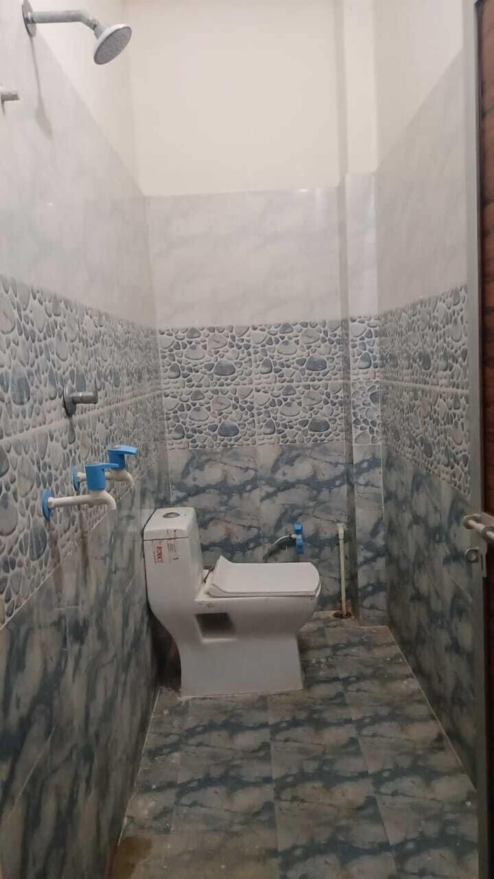 Shower, towels, soap, shampoo