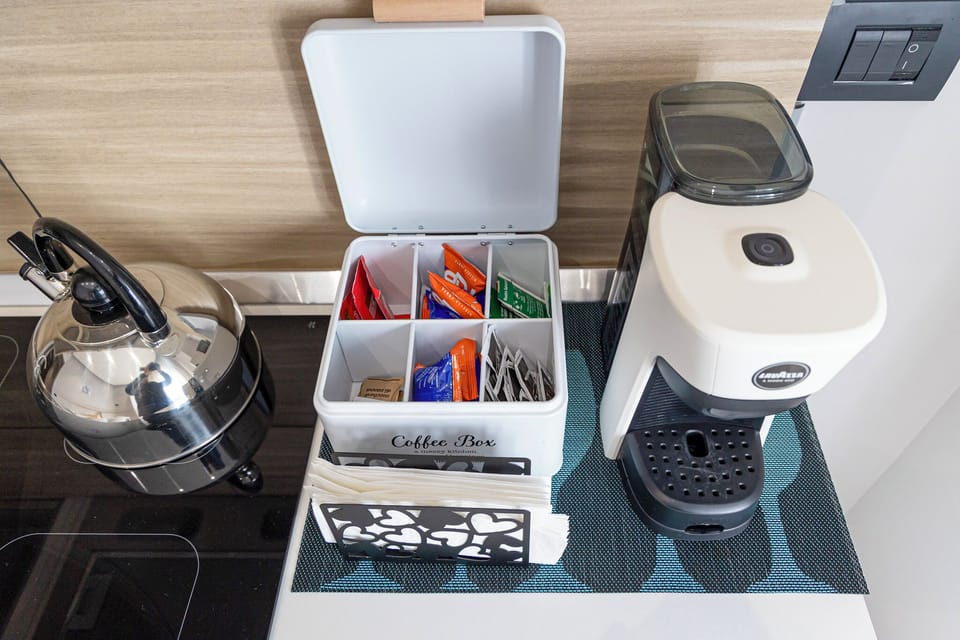 Condo, Balcony, City View | Private kitchen | Electric kettle