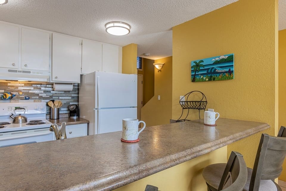 Condo, 2 Bedrooms | Private kitchen | Coffee/tea maker, fridge, oven, toaster