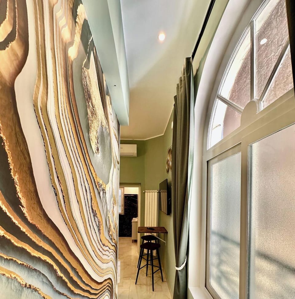 Double Room, Courtyard View | Minibar, desk, blackout drapes, iron/ironing board