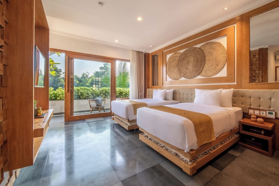 Luxury Suite, Balcony, Garden View | Minibar, in-room safe, desk, laptop workspace