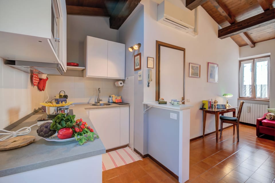 Standard Apartment, Multiple Bedrooms, Mountainside (Le Fontane With View Lake) | Private kitchen | Fridge, microwave, stovetop, dishwasher