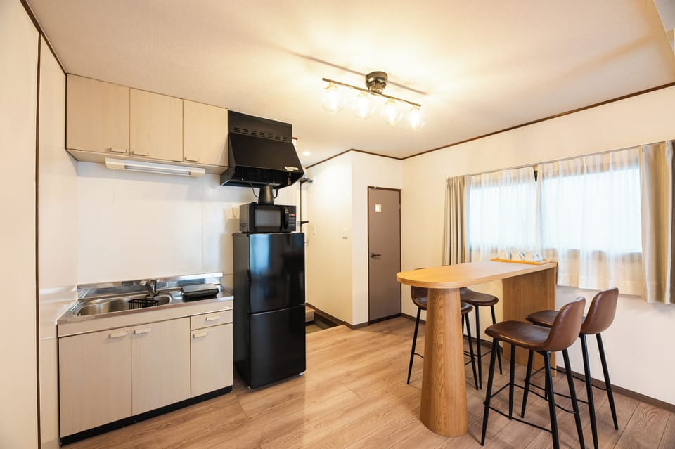 Family Room | Private kitchen | Fridge, microwave