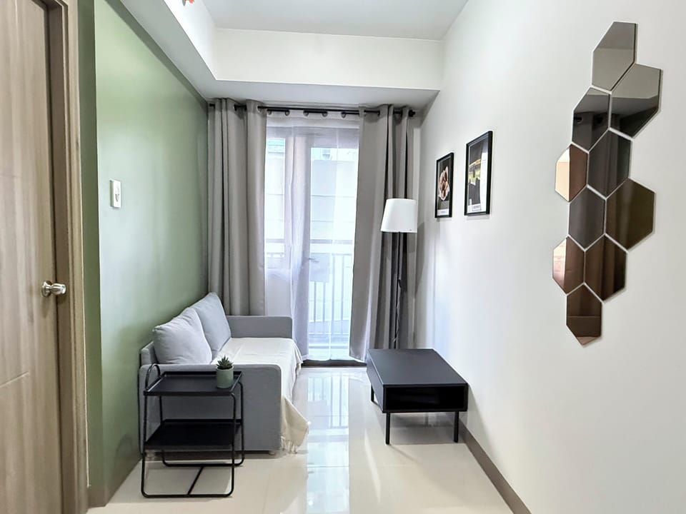 Standard Condo, 1 Bedroom, Non Smoking, Balcony | Living area | Flat-screen TV