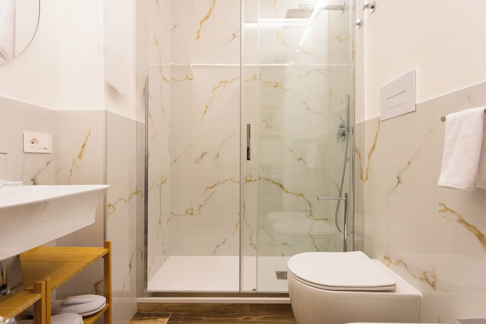 Superior Double Room, Balcony, City View | Bathroom | Shower, hair dryer, slippers, bidet