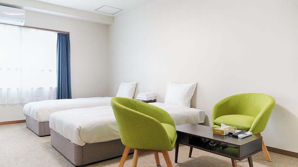 Standard Twin Room | Blackout drapes, iron/ironing board, free WiFi