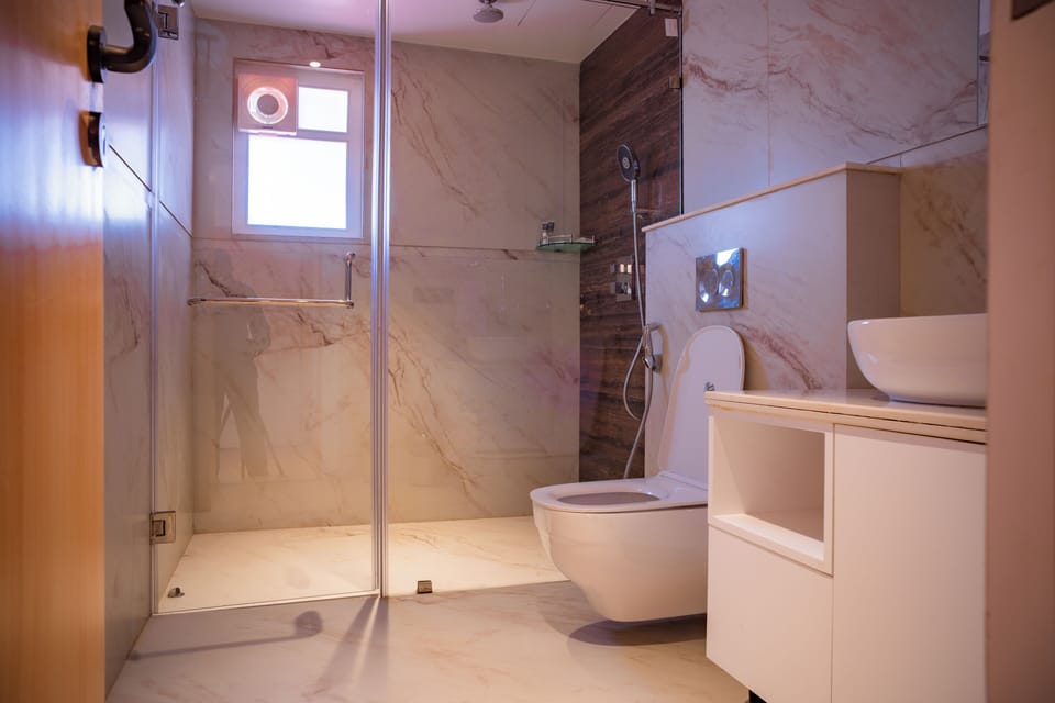 Shower, slippers, towels, soap