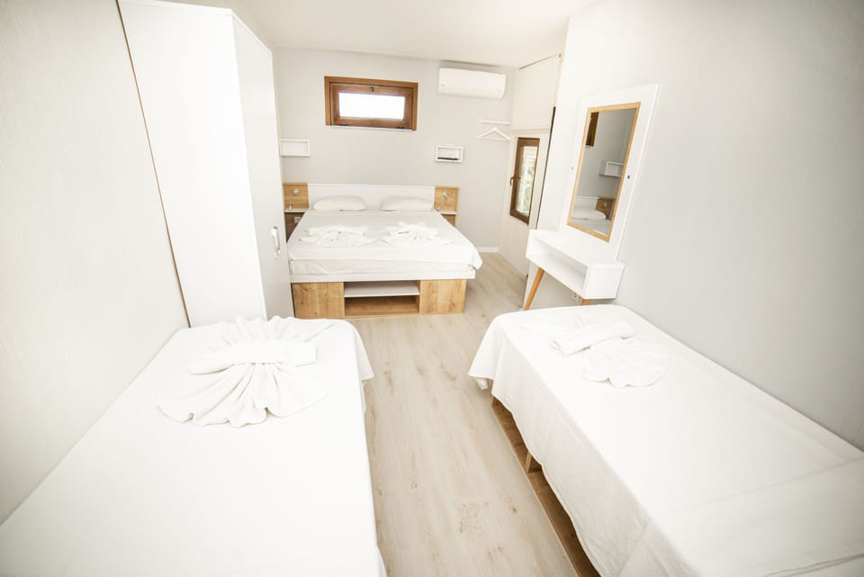 Economy Quadruple Room | Premium bedding, desk, blackout drapes, soundproofing