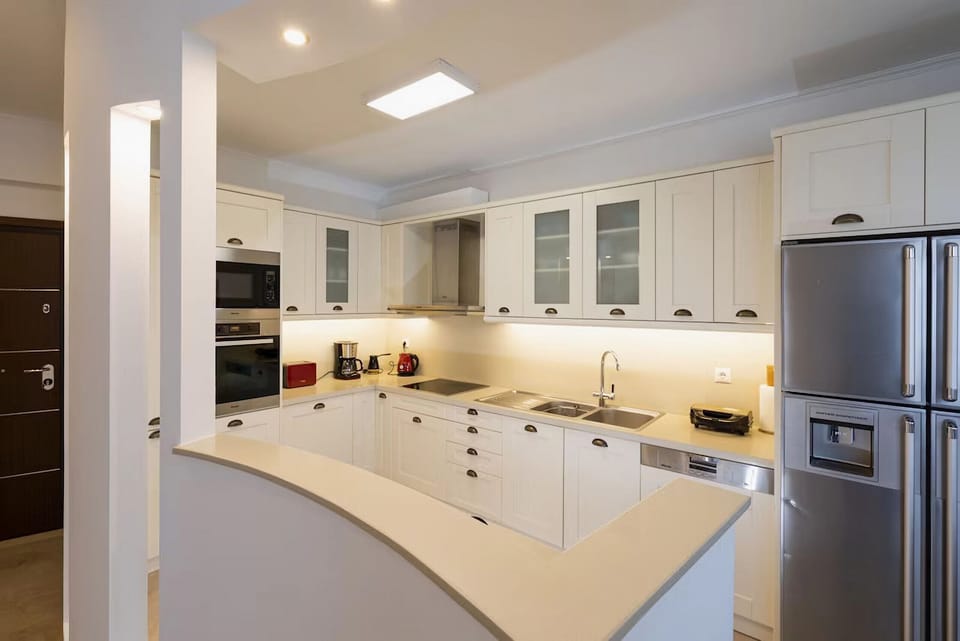 Apartment, 4 Bedrooms, Smoking, Terrace | Private kitchen | Microwave, coffee/tea maker, highchair
