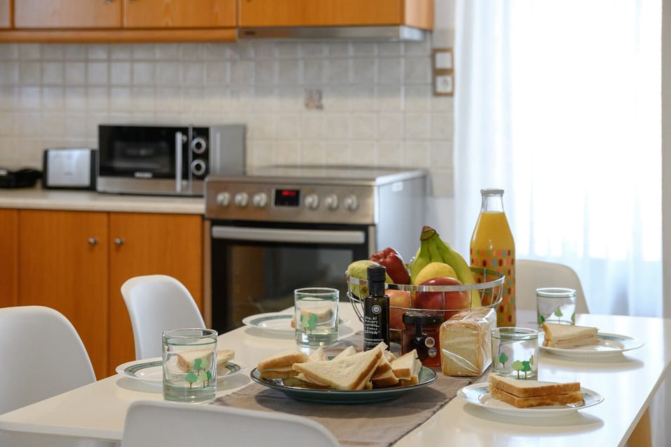 Microwave, coffee/tea maker, highchair, cookware/dishes/utensils