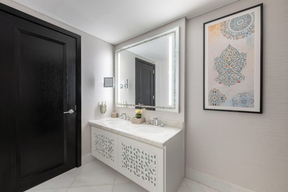 Suite, 1 Bedroom | Bathroom | Shower, rainfall showerhead, hair dryer, bathrobes