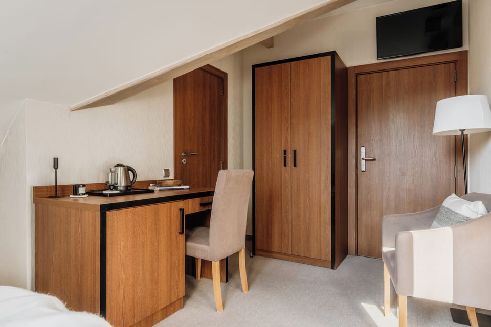 Standard Double or Twin Room | Minibar, in-room safe, individually decorated, desk