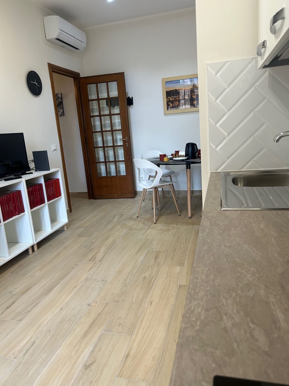 Apartment (1 Bedroom) | Living area | 32-inch flat-screen TV with cable channels