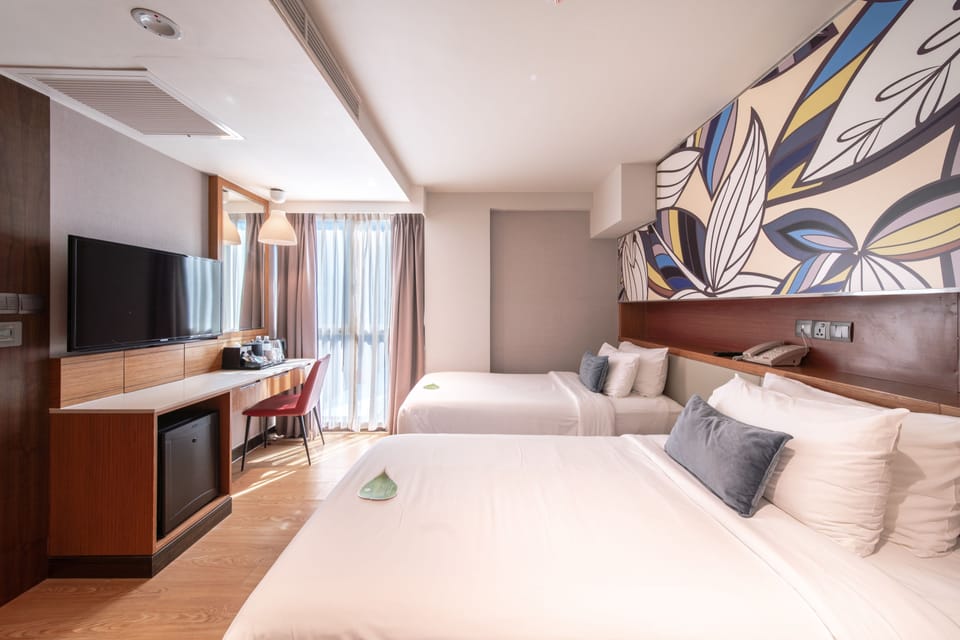 Deluxe Twin Room | Hypo-allergenic bedding available, minibar, in-room safe