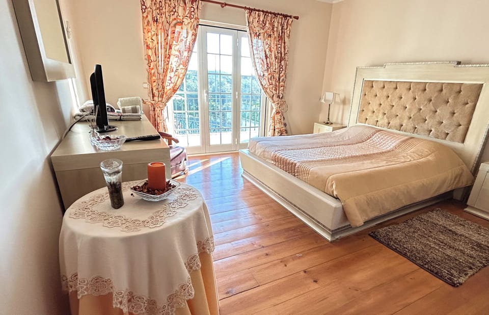 Deluxe Room, Balcony, Pool View | Minibar, WiFi (free)
