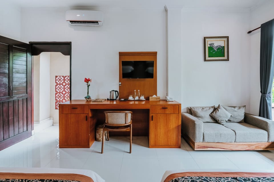 Superior Room | Living area | 32-inch Smart TV with satellite channels