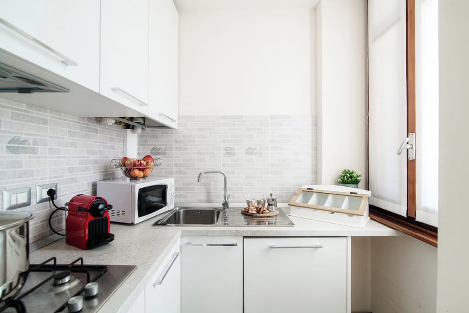 Apartment, Lake View | Private kitchen | Full-size fridge, oven, stovetop, dishwasher