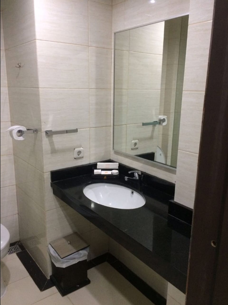 Combined shower/tub, free toiletries, hair dryer, slippers