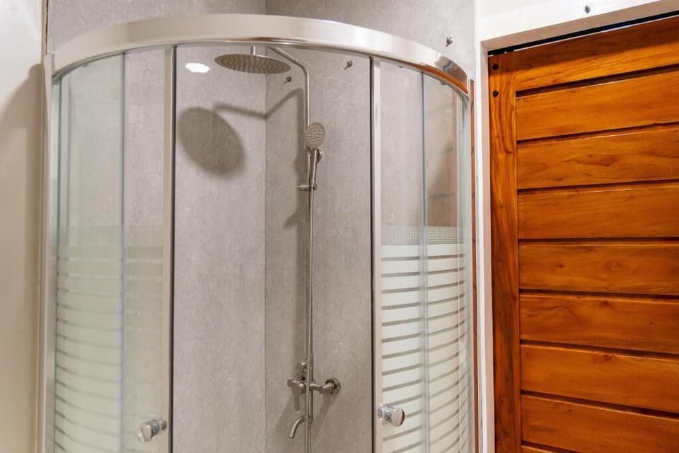 Family Room, Balcony, Hill View | Bathroom | Shower, free toiletries, slippers, bidet