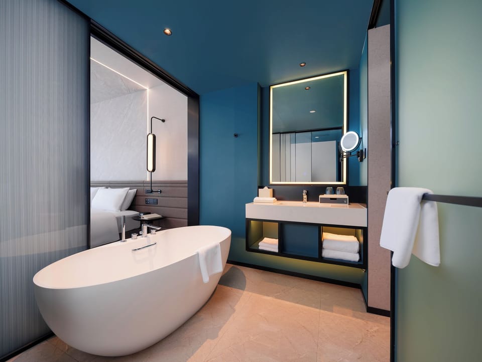 Family Suite, 2 Bedrooms | Bathroom | Free toiletries, hair dryer, bathrobes, slippers