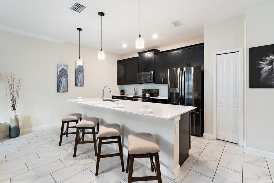 Townhome, 4 Bedrooms | Private kitchen | Coffee/tea maker, fridge, oven, toaster