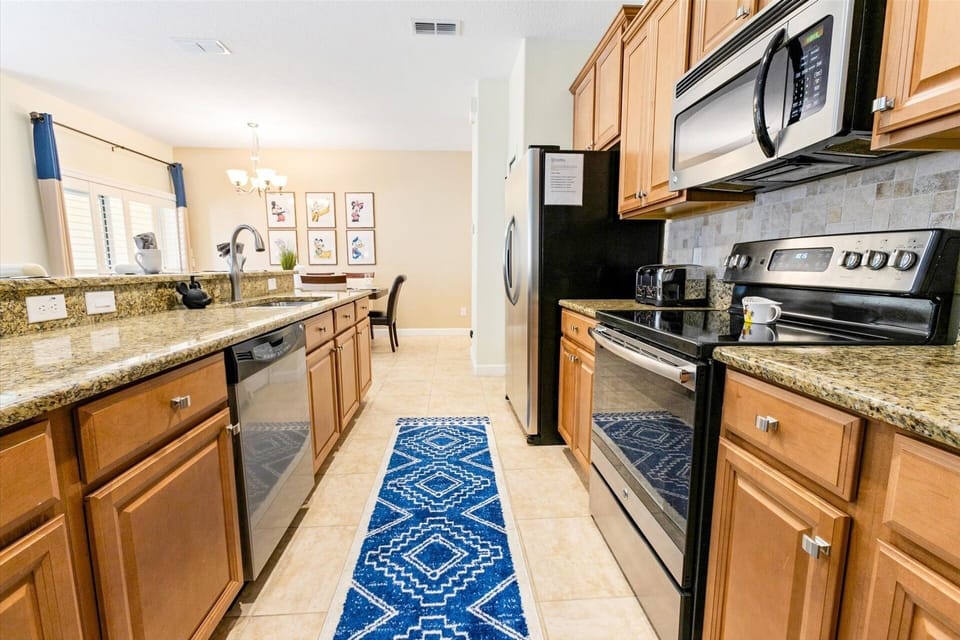 Townhome, 4 Bedrooms | Private kitchen | Coffee/tea maker, fridge, oven, toaster