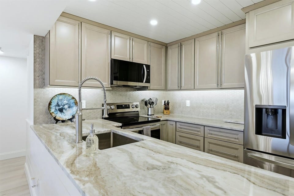 Condo, 2 Bedrooms | Private kitchen | Coffee/tea maker, fridge, oven, toaster
