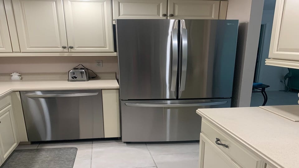Condo, 2 Bedrooms | Private kitchen | Fridge, oven, coffee/tea maker, toaster