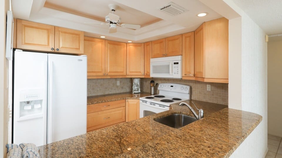 Condo, 2 Bedrooms | Private kitchen | Coffee/tea maker, fridge, oven, toaster