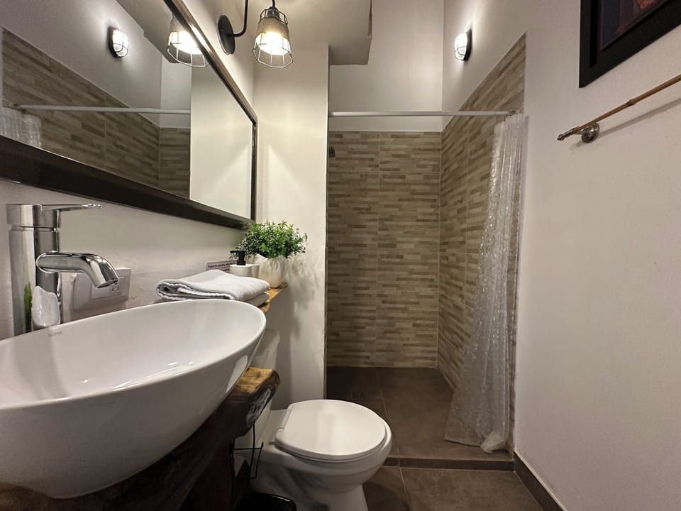 Shower, towels, soap, shampoo
